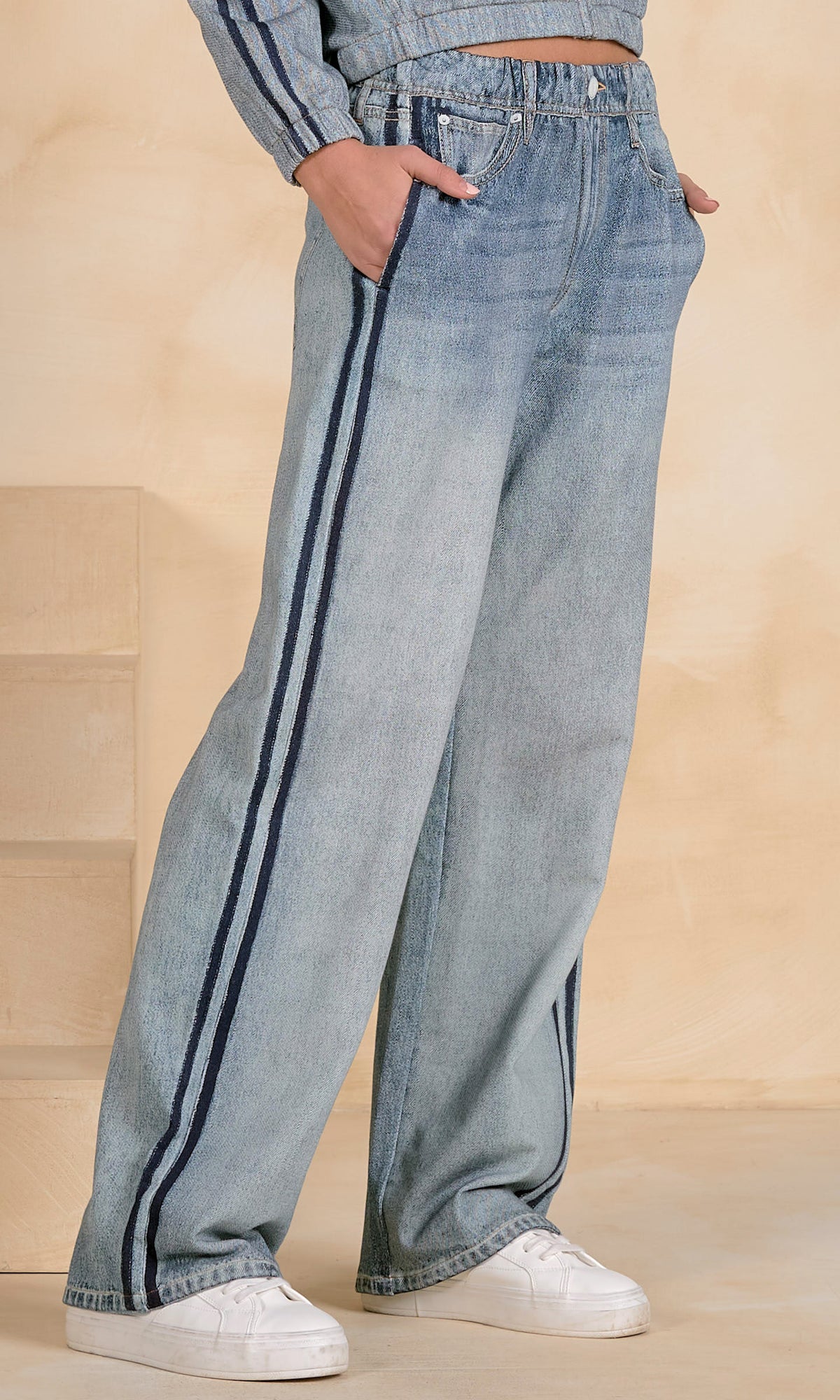 wide leg stripe jeans, women’s sporty denim, side stripe jeans women, relaxed fit wide leg jeans, boutique statement denim, trendy wide leg pants, elevated casual jeans, sporty chic denim, lightweight wide leg jeans, fashion forward denim