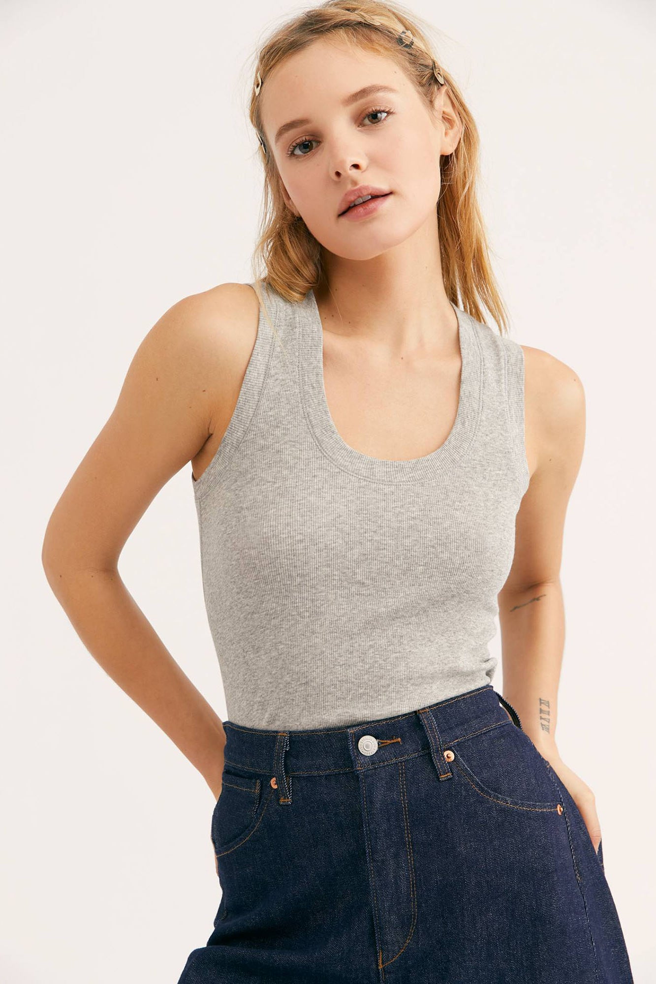 Free People U-Neck Tank Top. Essential ribbed tank top featuring a U-neckline and wide, muscle-style straps. Stretch fit Lightweight