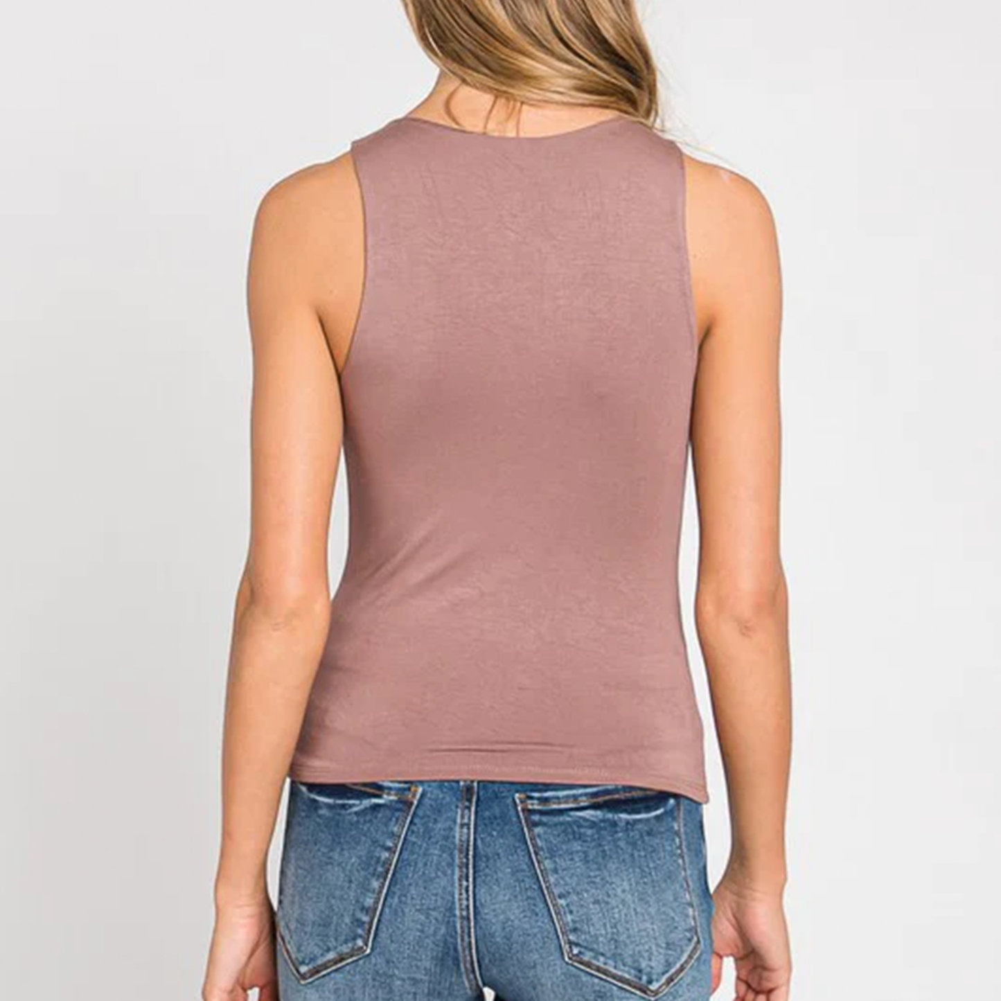 Moonbeam Round Neck Long Basic Knit Tank. Keep the basics around because they are the key to building the perfect wardrobe. this basic tank is soft to the touch and stretchy to flatter many body types. Perfect for layering, this basic tank can go with any outfit
