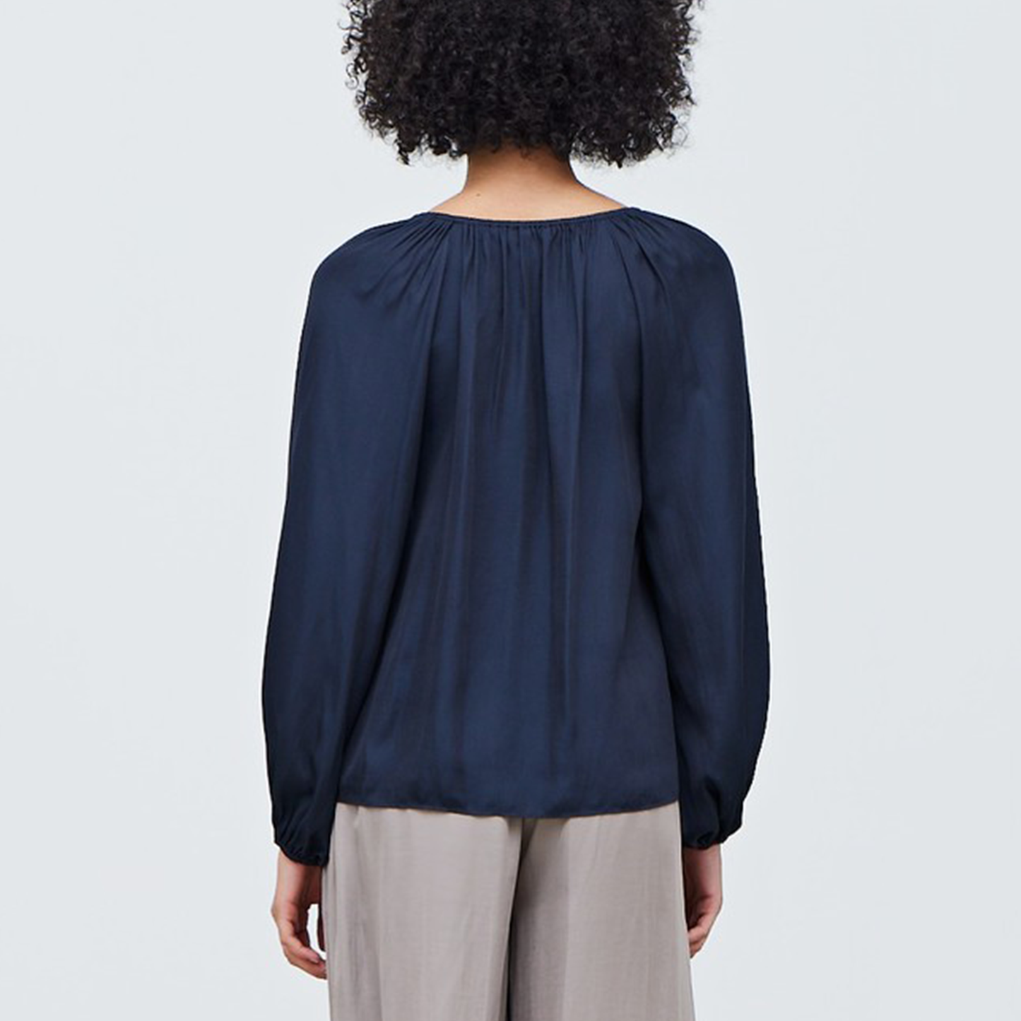Solid Satin Blouse. Whether you're updating your workwear or looking for a closet staple, this long-sleeve satin button-up checks all the boxes