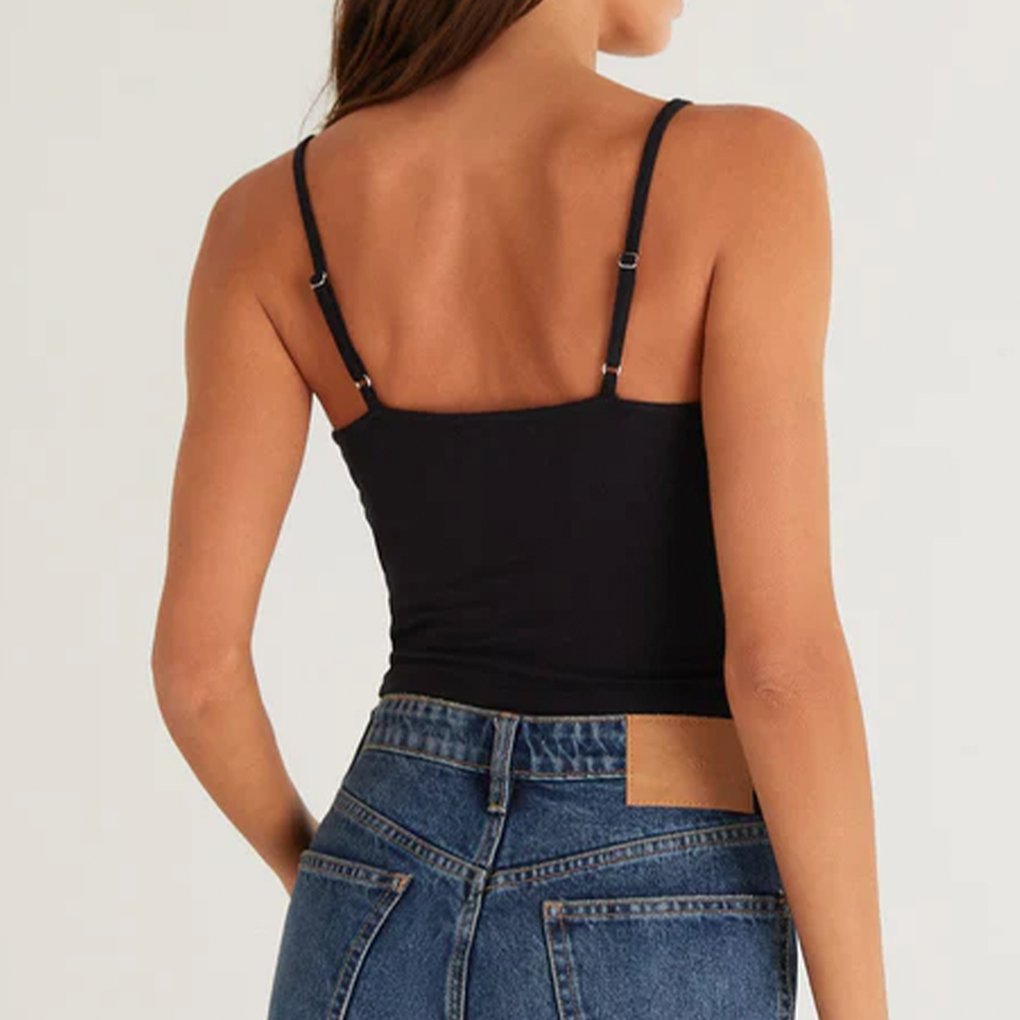Z Supply Nora Ruched Tank. The Nora Ruched Tank is that perfect tank for a night out with the girls. This top is impossible to ignore, and easy to style with jeans, hitting at the waistband. Made in a Sleek Jersey fabric, this unlined tank features shirring details throughout and adjustable straps to give you the ultimate fit
