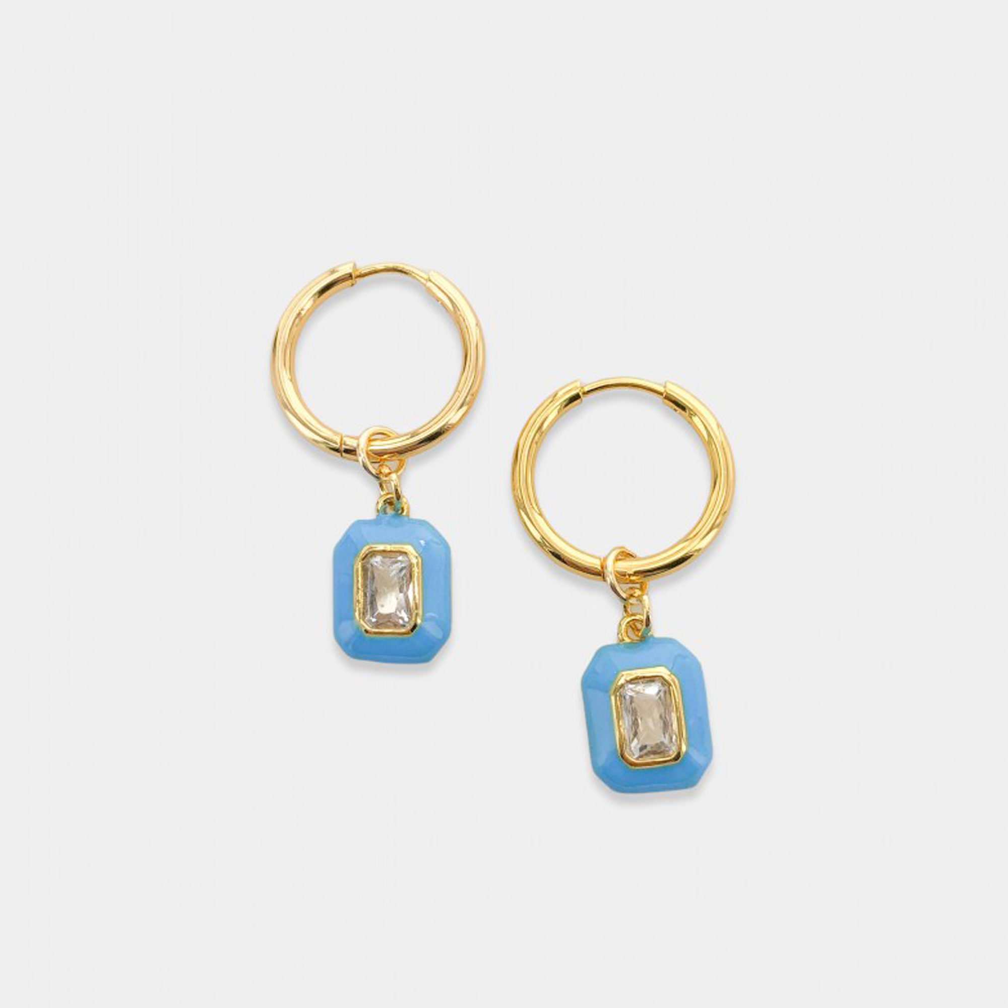 Round hoop earrings with dangling enamel cubic zirconia gem. The gem is removable, you may wear it alone as huggies or add one of our other charms or pendants to change up the look