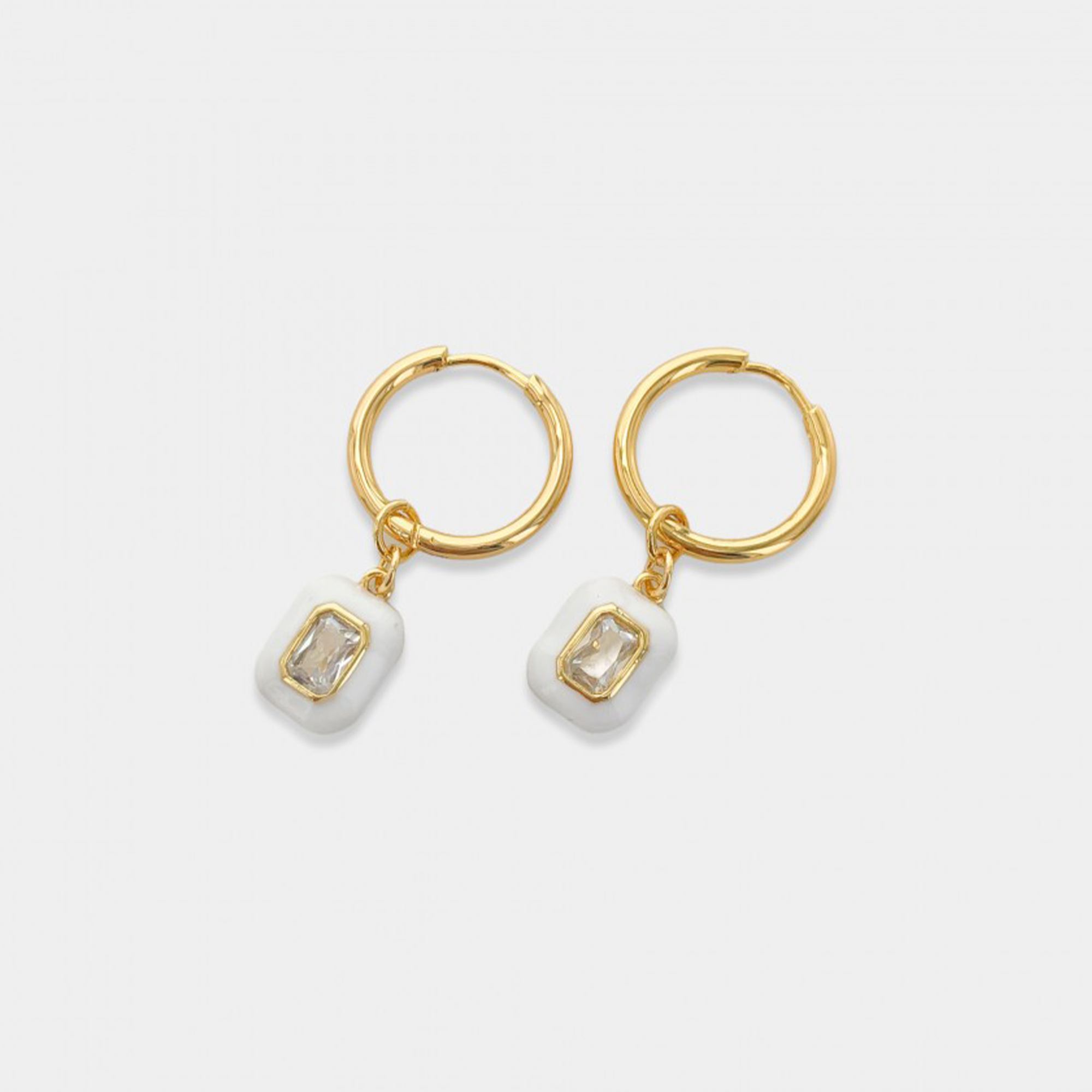 Round hoop earrings with dangling enamel cubic zirconia gem. The gem is removable, you may wear it alone as huggies or add one of our other charms or pendants to change up the look