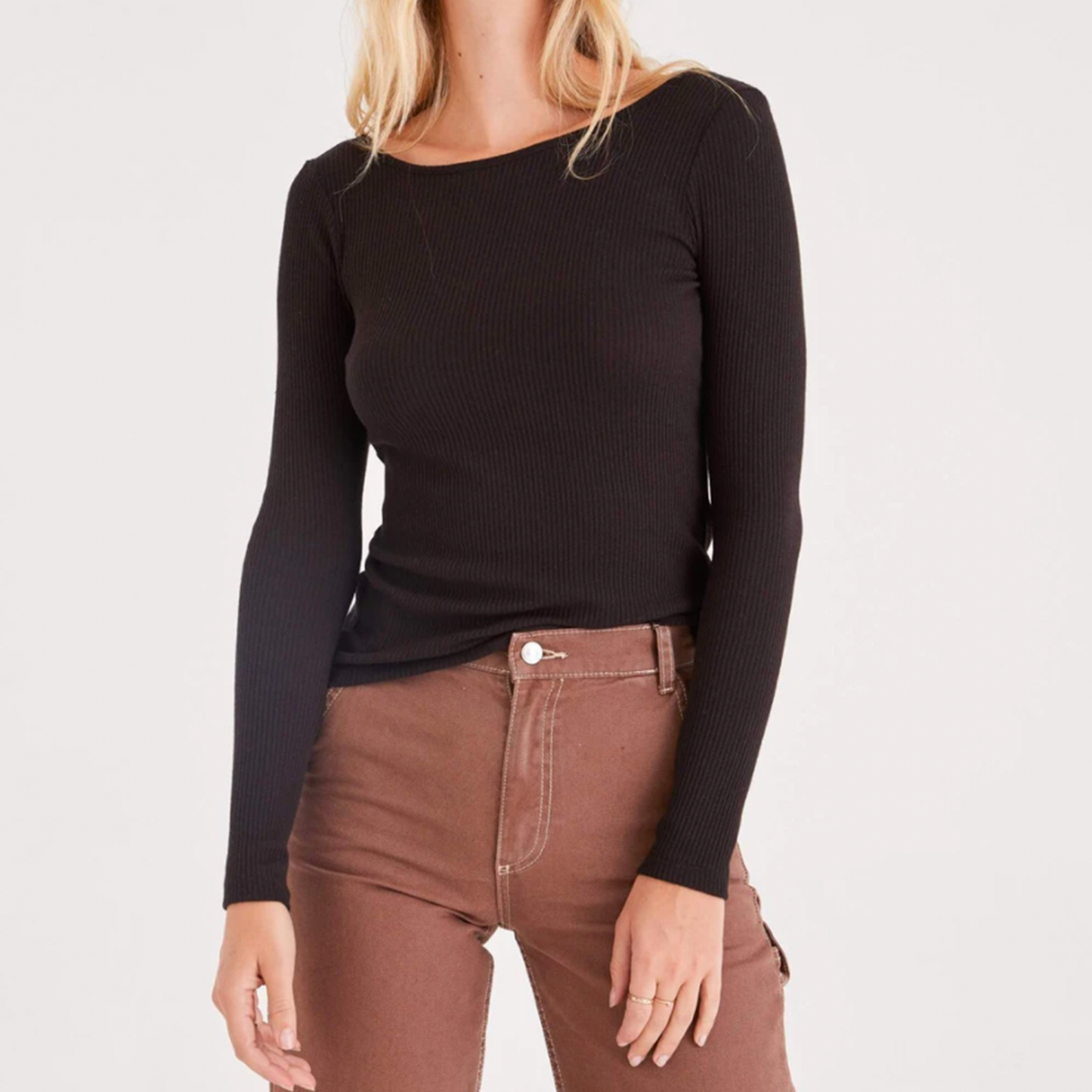 Project Social T Minah Scoop Back Long Sleeve. Body skimming and ultra flattering, a top that you're going to want to show off, especially the back. Made in a soft ribbed fabric, this top features a strappy scoop back. Wear with your favorite bottom, because this top will elevate any look