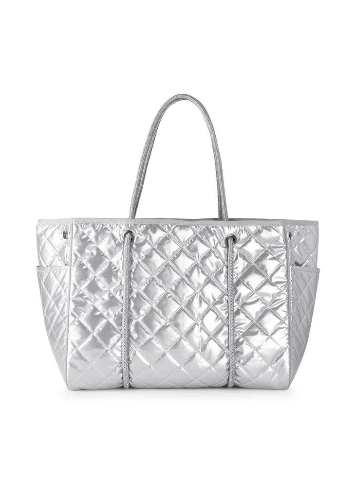 Haute Shore Greyson Shine Quilted Silver Puffer. This super cool silver tote is the perfect chic update to your basic neutral toned bag, the quilted lightweight design makes it perfect for using all day long.