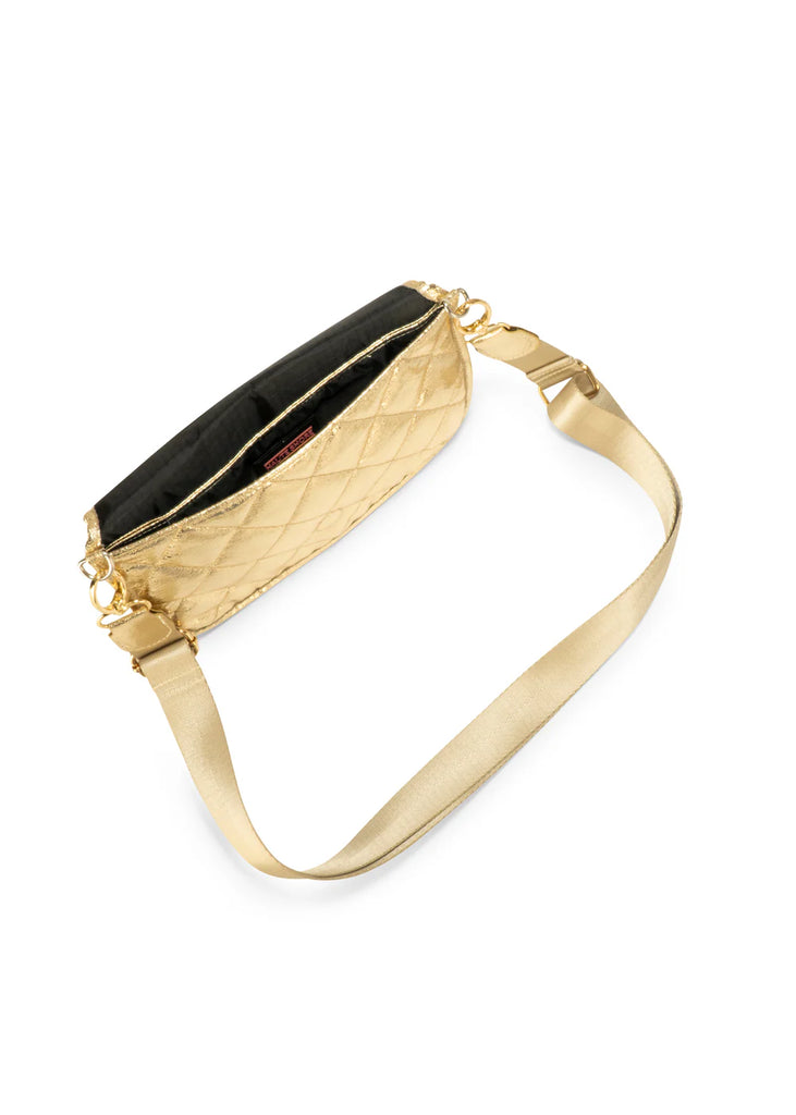 Haute Shore Rae Crossbody Gilt. This crossbody features a quilted design with a flap closure, the perfect size for everyday wear that can be used day or night as a crossbody or a clutch.