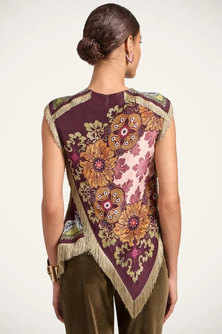 Model wearing the Mccolin Asymmetrical Fringe Cross Top in Wine, back view.