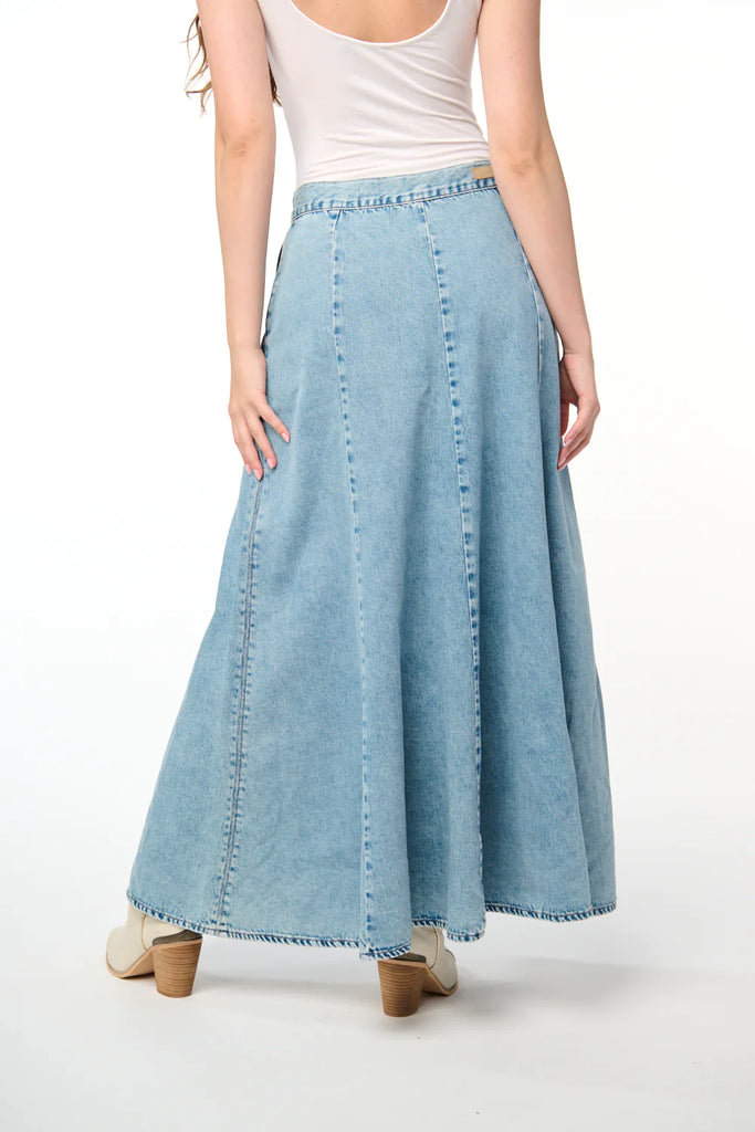 Blank NYC Denim Maxi Skirt Light Blue Denim. This long A-line denim maxi skirt is the perfect statement piece for spring and summer, wear it with a fitted top for a cool and comfortable look day or night.