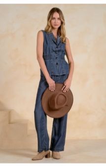 Model wearing the Elan Cinched Waist Vest in Navy Wash, full front view with matching pants.