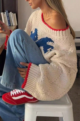 Model wearing the Mccolin Cropped Knit Sweater with Contrast Trim in Beige, side view.