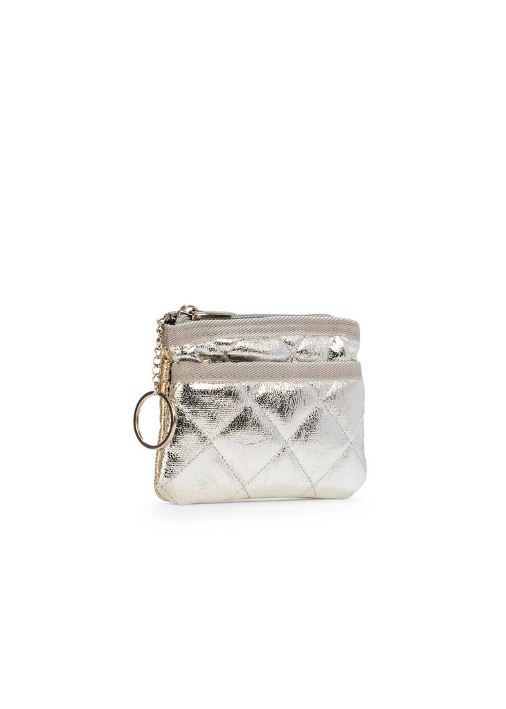 Haute Shore Max Mixx Gold and Silver Quilted Vegan Leather. This quilted card case comes in a chic duo chrome design and is the perfect everyday wallet to keep all your essentials close by.