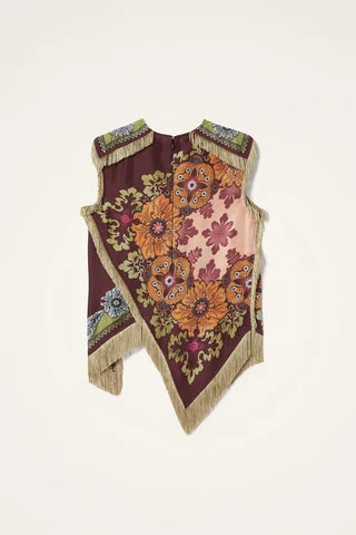 Mccolin Asymmetrical Fringe Cross Top in Wine displayed flat, front view.