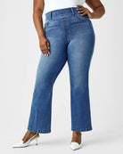 Spanx Kick Flare Jeans Blue. Designed with premium stretch denim, high-rise coverage and hidden core shaping technology, this pull-on jean features a flattering kick flare leg.
