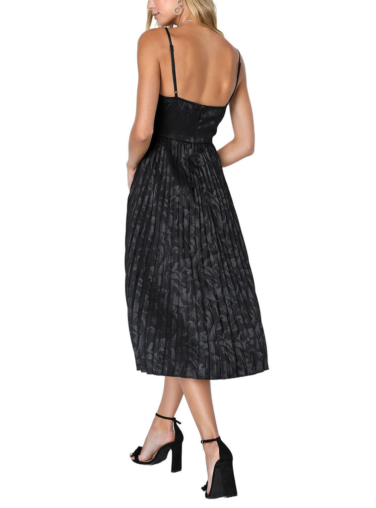 Anastasia Pleated Midi Dress Black. This midi dress features sleek woven satin, with floral embossing, adjustable spaghetti straps that support a bustier-inspired bodice with a high waist. Skirt features elegant pleating as it falls to a midi hem.