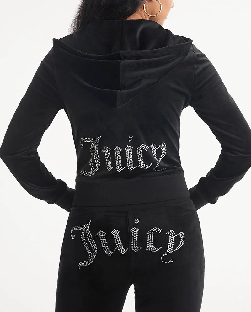 Juice Couture Classic Juice Hoodie Licorice. This classic velour hoodie is the perfect mix of cozy and glam.The back embellishment showcases the bright brand logo while the soft stretch fabric keeps you feeling conveniently cozy.