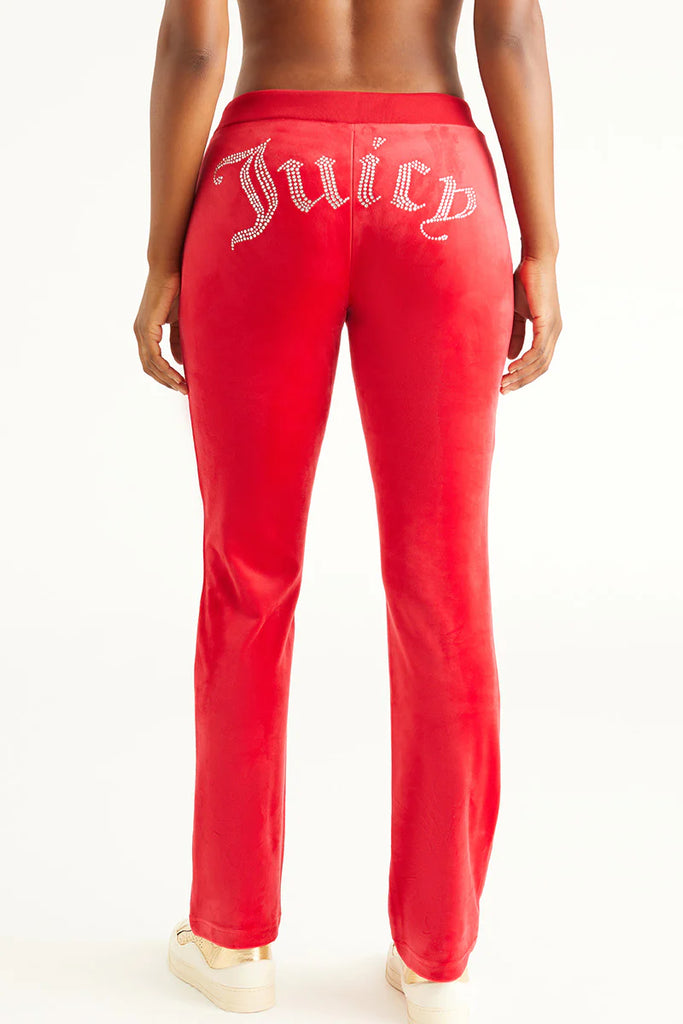 Juice Couture Velour Pant Coco Red. For a luxury look that commands attention, these bling velour pants provide exactly what you need to stand out in style. The ribbed elastic waistband and soft stretch fabric create a cozy fit and feel for all day wear.