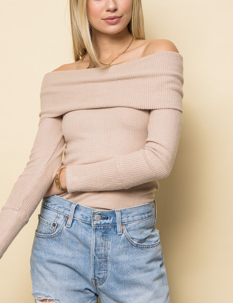 Amy Rib Off The Shoulder Sweater Sand. This super soft off the shoulder sweater is a must have for your winter wardrobe, it looks amazing on everyone and is so cute and cozy.