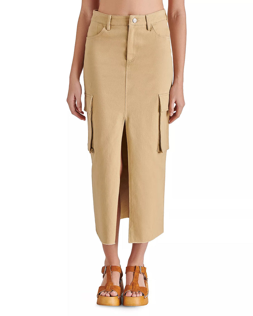 Steve Madden Benson Skirt Mushroom. The Benson Skirt is the perfect addition to your spring wardrobe. This y2k-inspired maxi skirt features a deep front slit and cargo details, making it both stylish and functional.