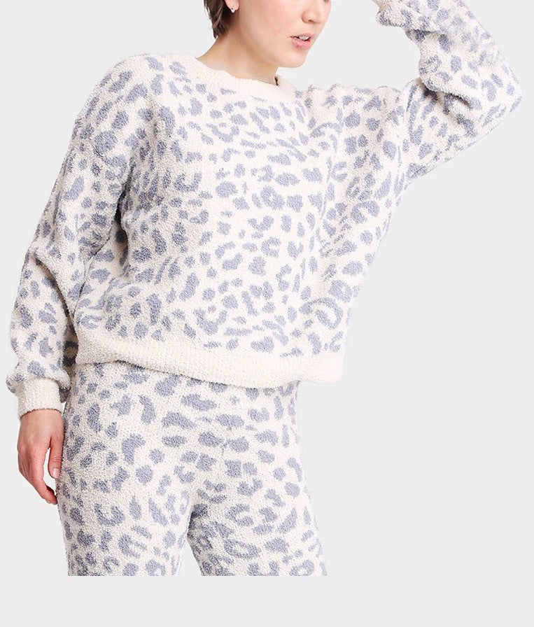 Marlee Soft Leopard Top Blue. This super soft crewneck pullover features a leopard print throughout, perfect for hanging at home during a movie night or running errands during the day.