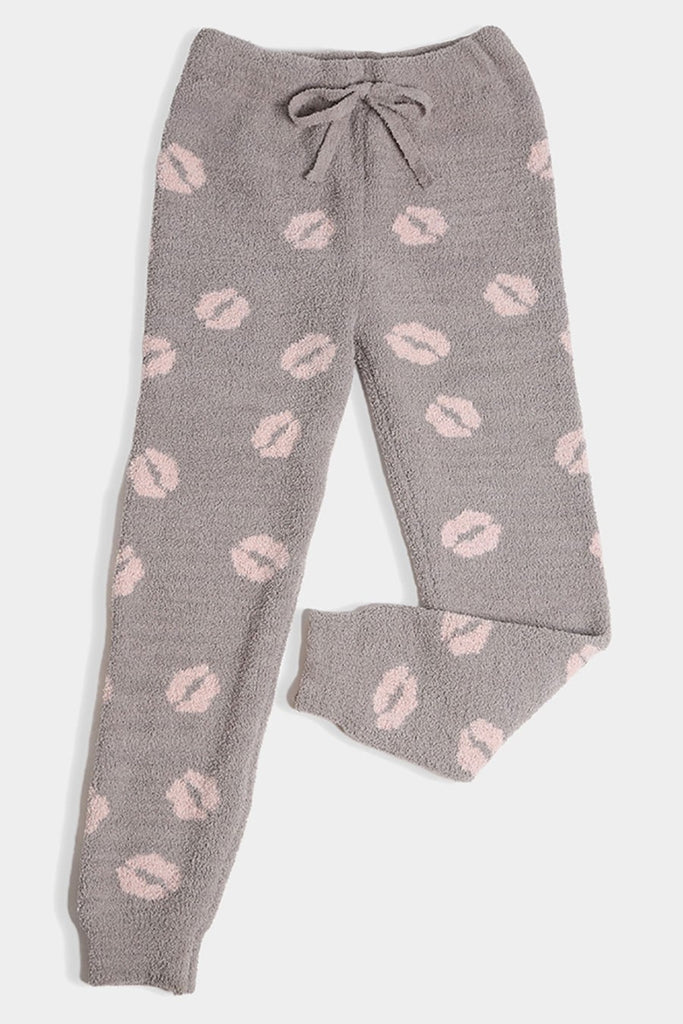 Arianna Soft Lip Pant Grey. These super soft pants feature an adorable lip print throughout and a drawstring tie waist for the perfect fit and a back pocket.