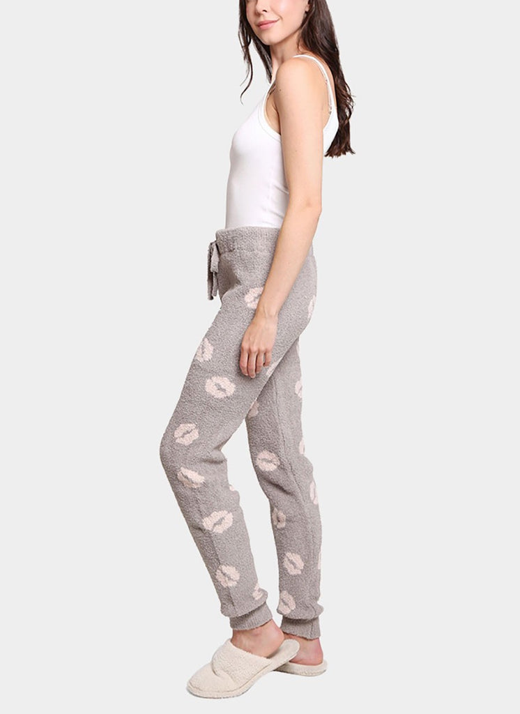 Arianna Soft Lip Pant Grey. These super soft pants feature an adorable lip print throughout and a drawstring tie waist for the perfect fit and a back pocket.