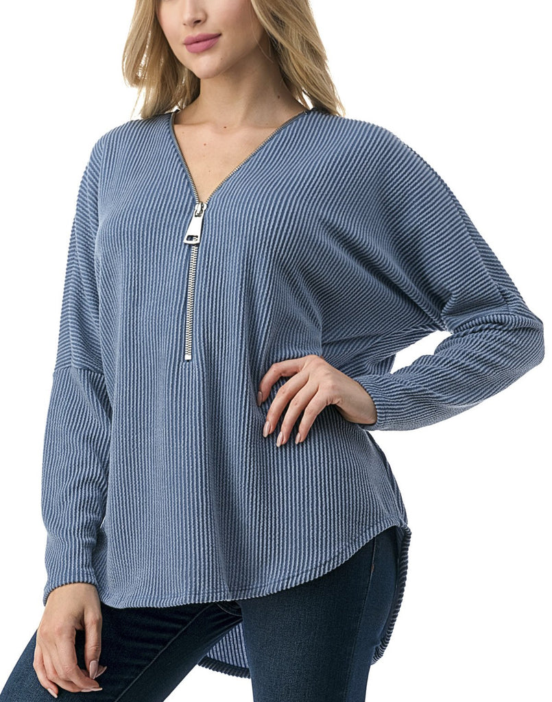 Quinn Dolman Sleeve Zipper Top Denim. This dolman sleeve zip top is the perfect everyday piece to add to your rotation, wear it with jeans or leggings for an effortless everyday look.