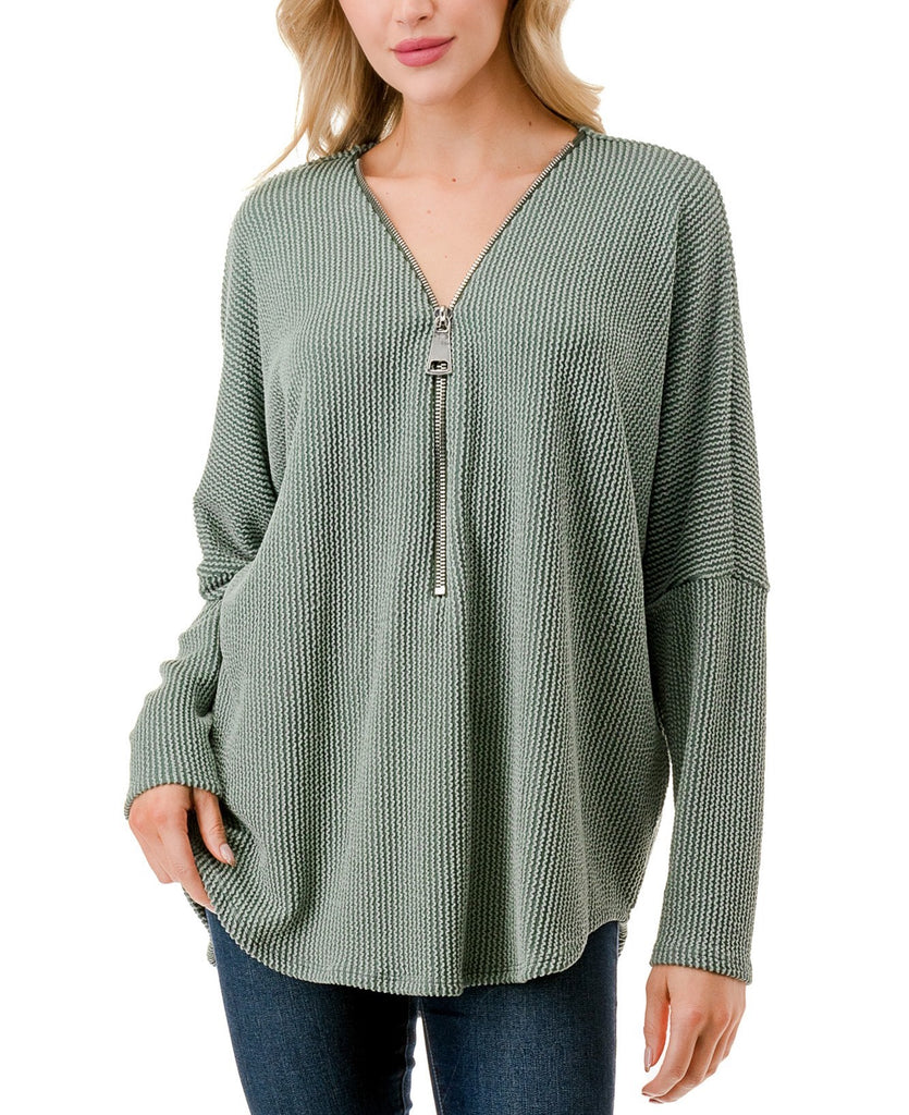 Quinn Dolman Sleeve Zipper Top Sage. This dolman sleeve zip top is the perfect everyday piece to add to your rotation, wear it with jeans or leggings for an effortless everyday look.