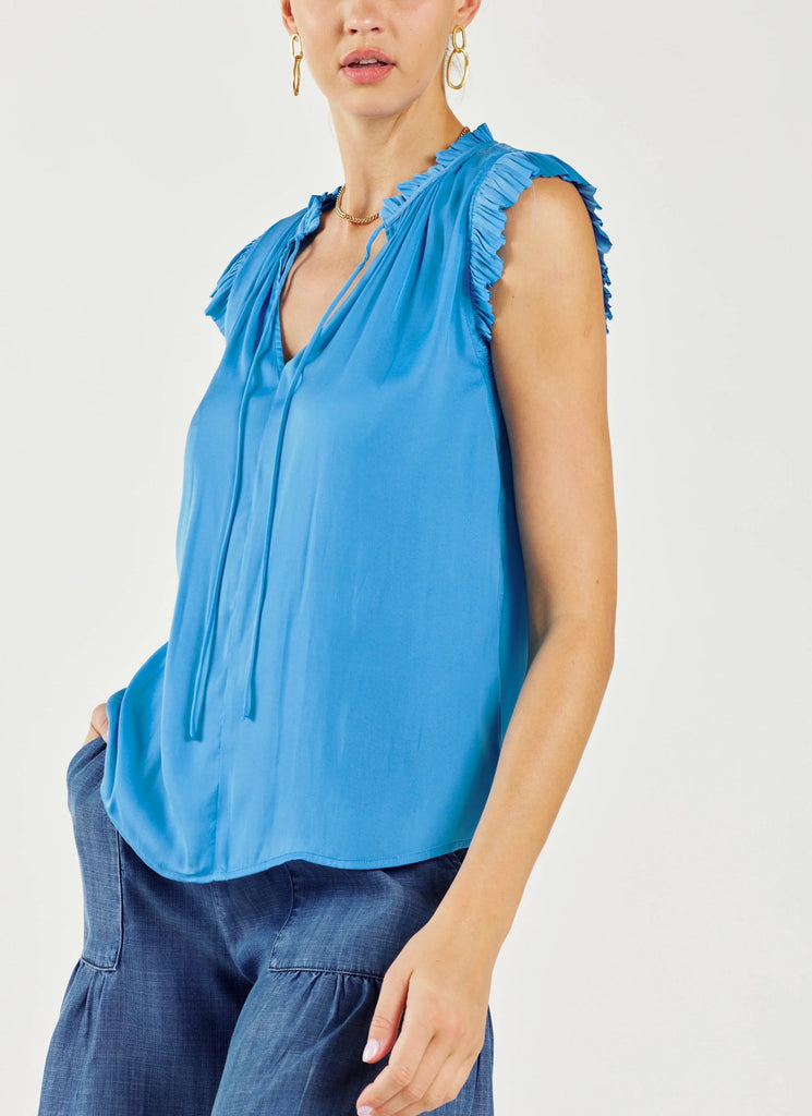 Current Air Pleated Sleeve Ruffle Blouse Tranquil Blue. This pleated sleeve top is cut for a loose, easy fit and features a flattering split neckline with ruffle trim and tie detailing, a new favorite for your everyday wardrobe.
