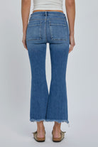 Hidden Inseam Happi Cargo Flare Medium Dark. These trendy flare jeans feature cargo front pockets and a frayed bottom hem in a comfortable stretch denim fabric that's perfect for everyday.
