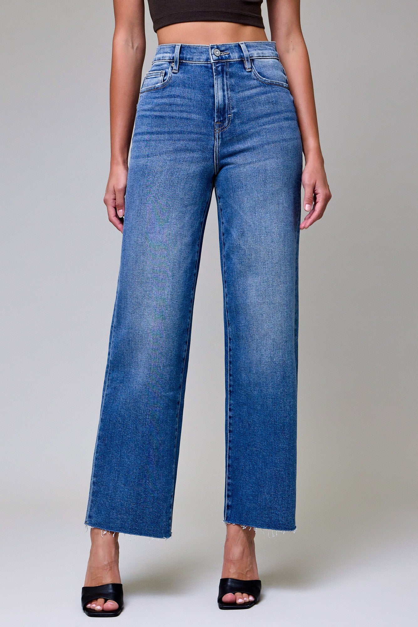 high rise straight jeans, cropped straight leg denim, medium wash jeans, raw hem jeans, everyday blue jeans, women’s straight jeans, modern denim fit, cropped jeans women, flattering high waist denim, wardrobe essential jeans, medium blue straight jeans, relaxed straight leg