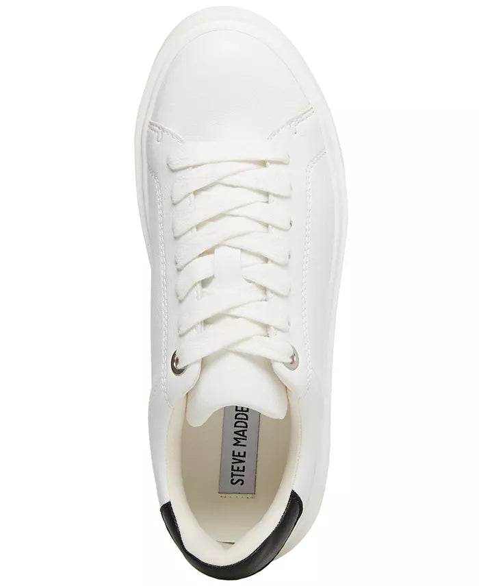 Steve Madden Charlie Sneaker White. A contrast accent at the counter interrupts the clean monochrome look of a street-chic sneaker elevated by a platform sole, perfect for everyday wear.