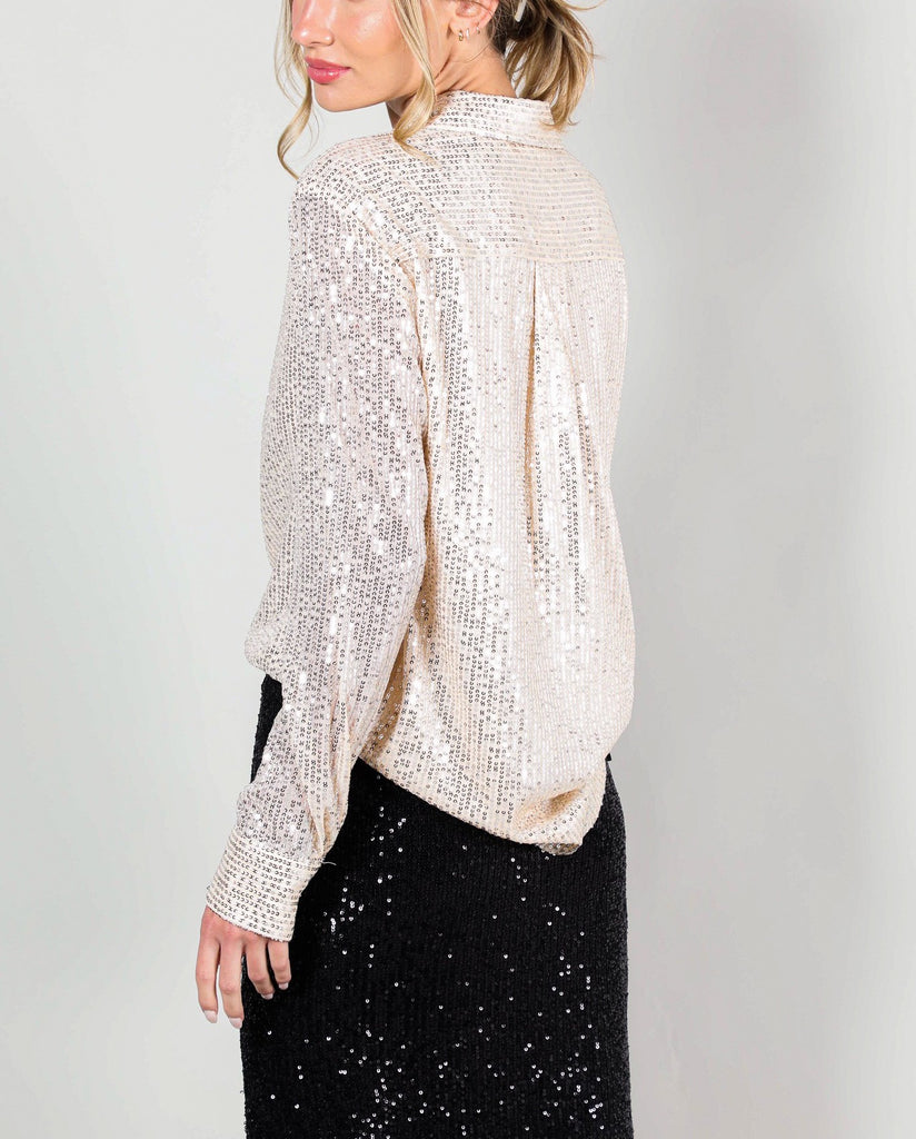 Sonia Button Down Sequin Top Champagne. This long sleeve sequin top features buttons down the front and at the cuff, wear it open over your fav top or closed for a statement sequin look.