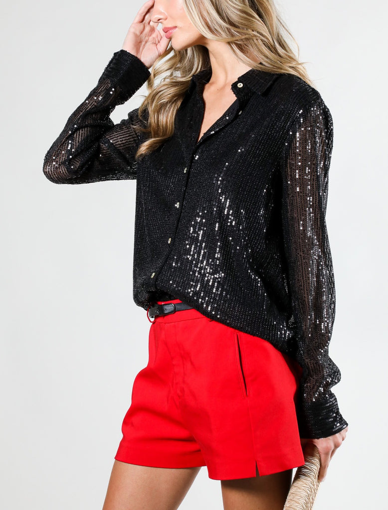 Sonia Button Down Sequin Top Black. This long sleeve sequin top features buttons down the front and at the cuff, wear it open over your fav top or closed for a statement sequin look.