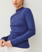 Moonbeam Long Sleeve Sweater Cobalt Blue. This ribbed long sleeve sweater features a mock neckline and fitted design making it the perfect layering piece for everyday.