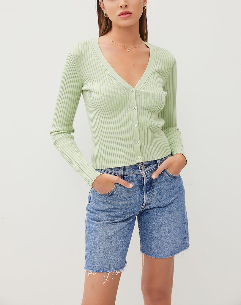Amina Rib V-Neck Slim Cardi Sprout. This slim fit cardigan features a v-neckline and button down front in a soft ribbed fabric, perfect for wearing open for an extra layer or on its own buttoned closed.