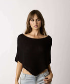 Moonbeam Short Boat Neck Poncho Sweater in Black, front view