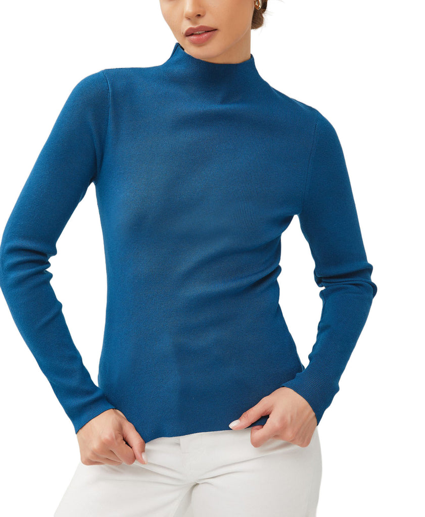 Lightweight Turtleneck Sweater Blue. This lightweight turtleneck sweater is a great basic to have in your closet for the fall and winter, pair it with your favorite jeans for a simple put together look.