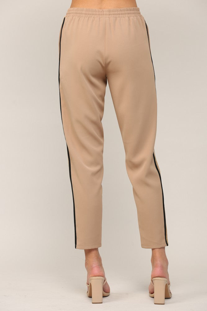 Fate Stripe Detail Jogger Tan. These joggers feature a contrast side twill tape trim design with a drawstring waistband, perfect for a sporty throwback look.