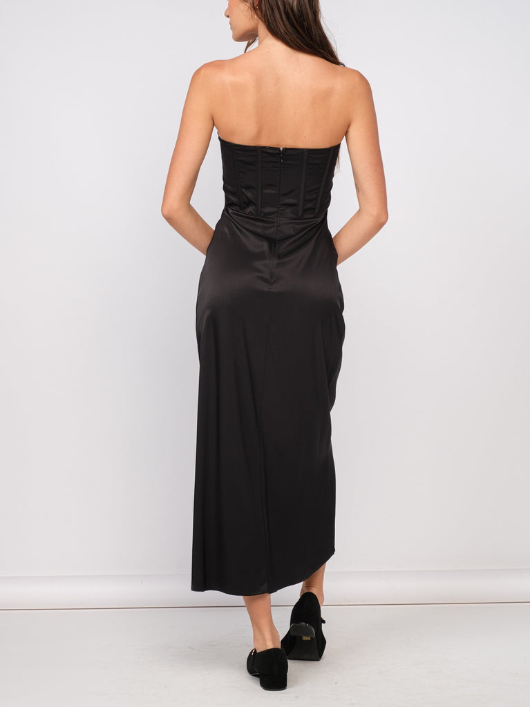 Ava Corset Satin Maxi Dress Black. This strapless satin maxi dress features a corset style bust and a zip back closure, perfect for looking chic at any special occasion.
