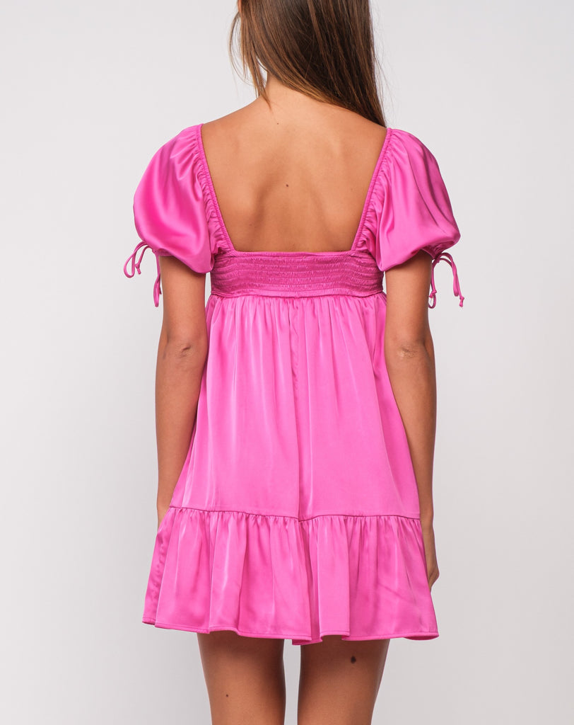 Rylee Puff Sleeve Mini Dress Rose. This adorable mini dress features puff sleeves and sweetheart neckline, perfect for a feminine flirty look for any event.