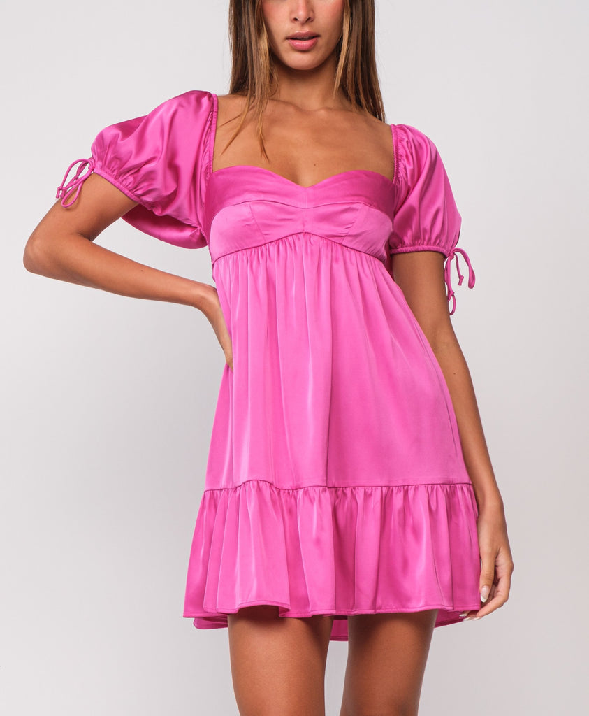 Rylee Puff Sleeve Mini Dress Rose. This adorable mini dress features puff sleeves and sweetheart neckline, perfect for a feminine flirty look for any event.