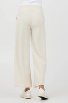Vintage Havana Cloud Fleece Flare Pant Sand. These flare pant joggers come in the softest cloud fleece fabric and feature an elastic waistband with front pockets, perfect for hanging at home or on the go.