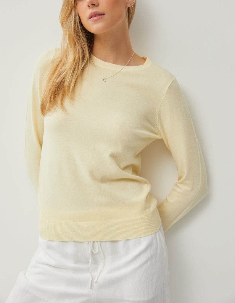 Gracelyn Classic Sweater Lemon Sherbert. This classic sweater features a round neckline and a super soft fabric, a must have basic to add to your closet for year round wear.