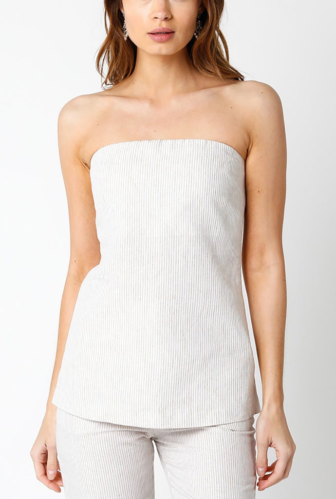 Rebecca Strapless Linen Top White. This strapless linen top is the perfect simple piece to add to your closet for a chic timeless look, pair it with jeans for the perfect everyday outfit.