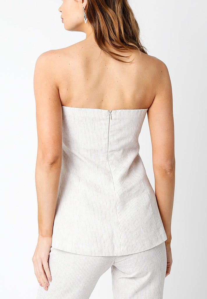 Rebecca Strapless Linen Top White. This strapless linen top is the perfect simple piece to add to your closet for a chic timeless look, pair it with jeans for the perfect everyday outfit.