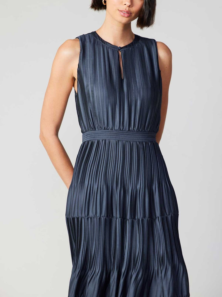 Current Air Pleated Maxi Dress Slate Navy. This pleated&nbsp;sleeveless maxi dress features a split neck with button closure, the perfect mix of casual and elegant making it so easy to dress up or down.