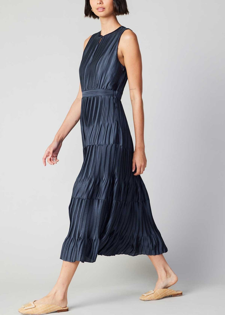 Current Air Pleated Maxi Dress Slate Navy. This pleated&nbsp;sleeveless maxi dress features a split neck with button closure, the perfect mix of casual and elegant making it so easy to dress up or down.