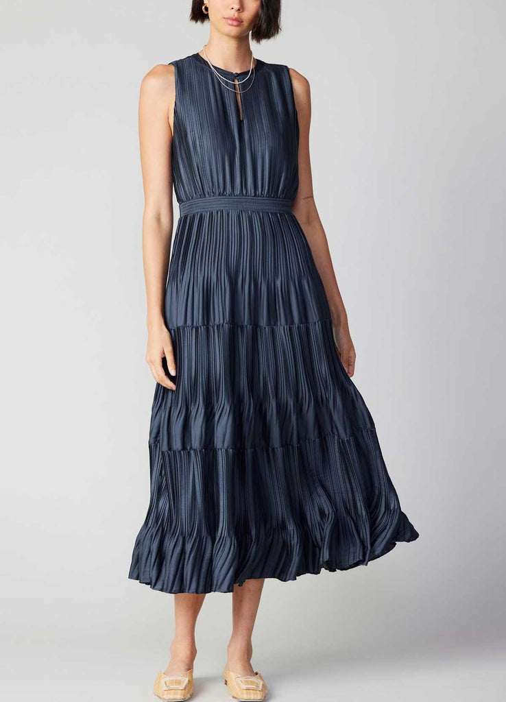 Current Air Pleated Maxi Dress Slate Navy. This pleated&nbsp;sleeveless maxi dress features a split neck with button closure, the perfect mix of casual and elegant making it so easy to dress up or down.