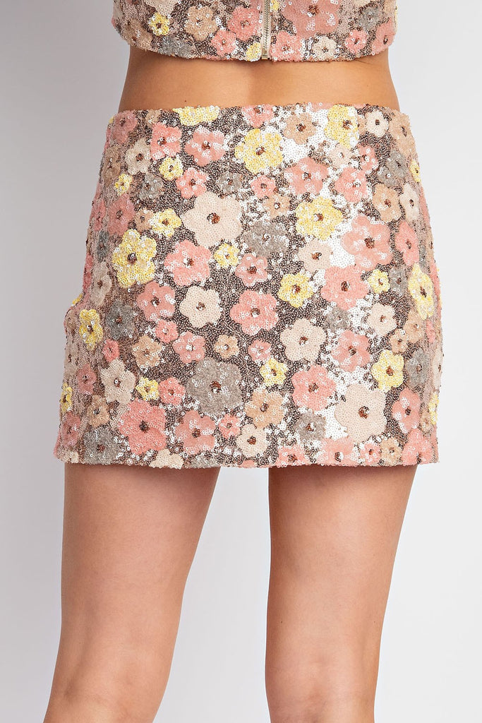 Bailey Flower Sequin Mini Skirt Rose Gold. This sequin flower mini skirt is so pretty and eye catching, you can wear it by itself with your favorite top or with the matching crop top for an amazing set.