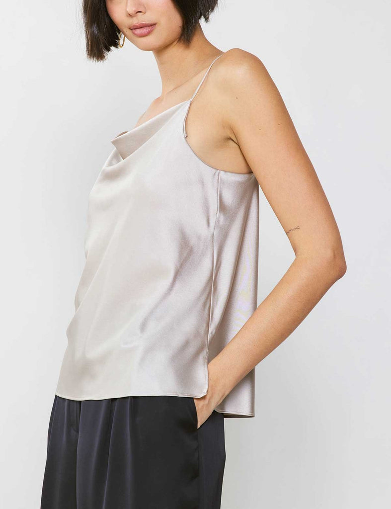 Current Air Cowl Neck Cami Champagne. A softly draped cowl neckline emphasizes the slinky shape of this sexy cami top suspended by teeny spaghetti straps. Minimalist in style, maximum allure.